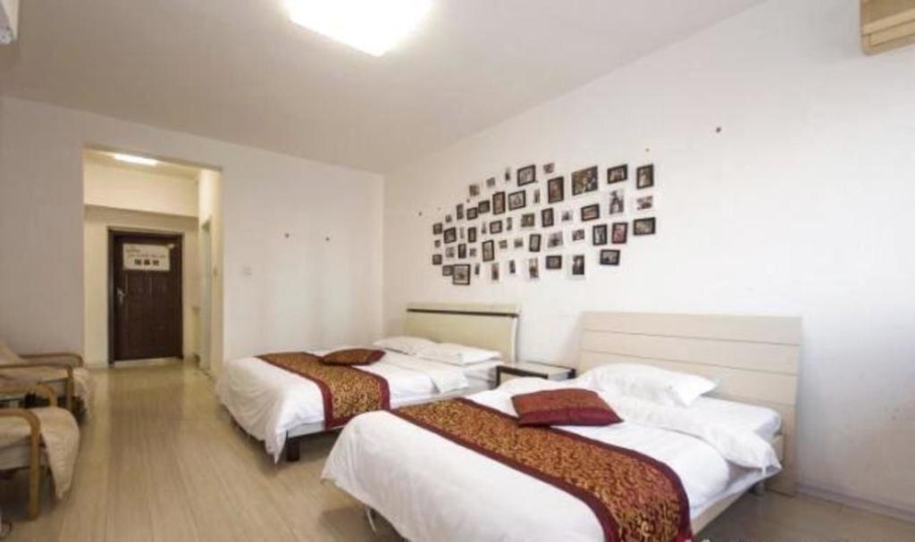 Паниин: Panjin Xinyuan ApartHotel