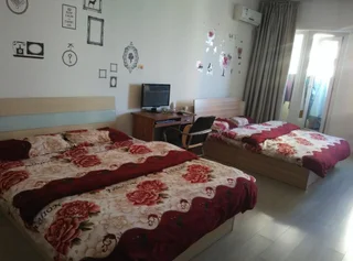 Паниин: Panjin Xinyuan ApartHotel