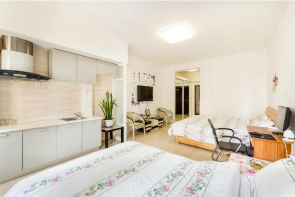 Паниин: Panjin Xinyuan ApartHotel