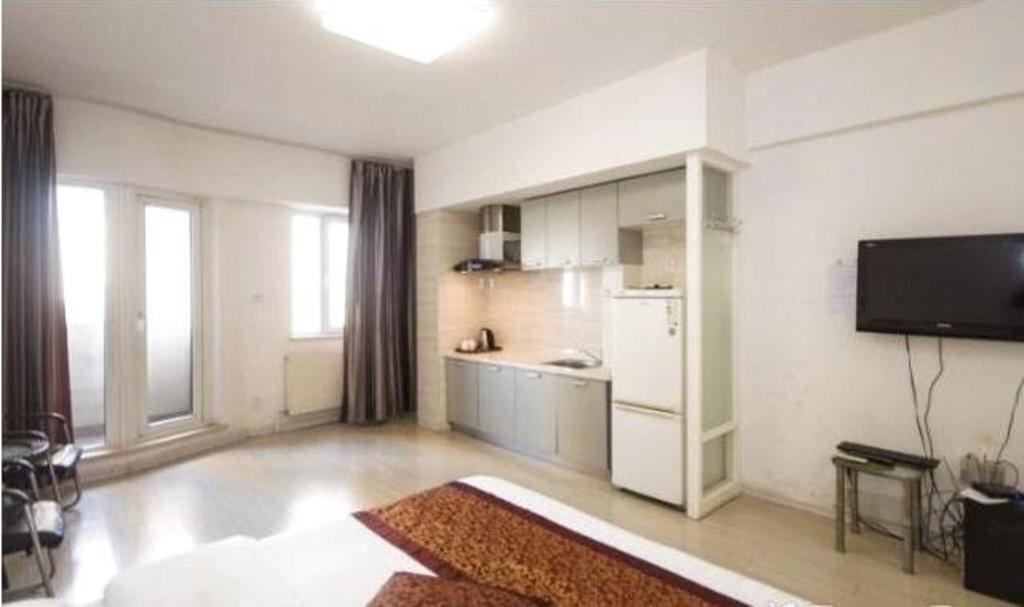 Паниин: Panjin Xinyuan ApartHotel