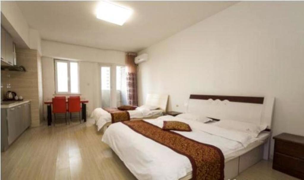 Паниин: Panjin Xinyuan ApartHotel