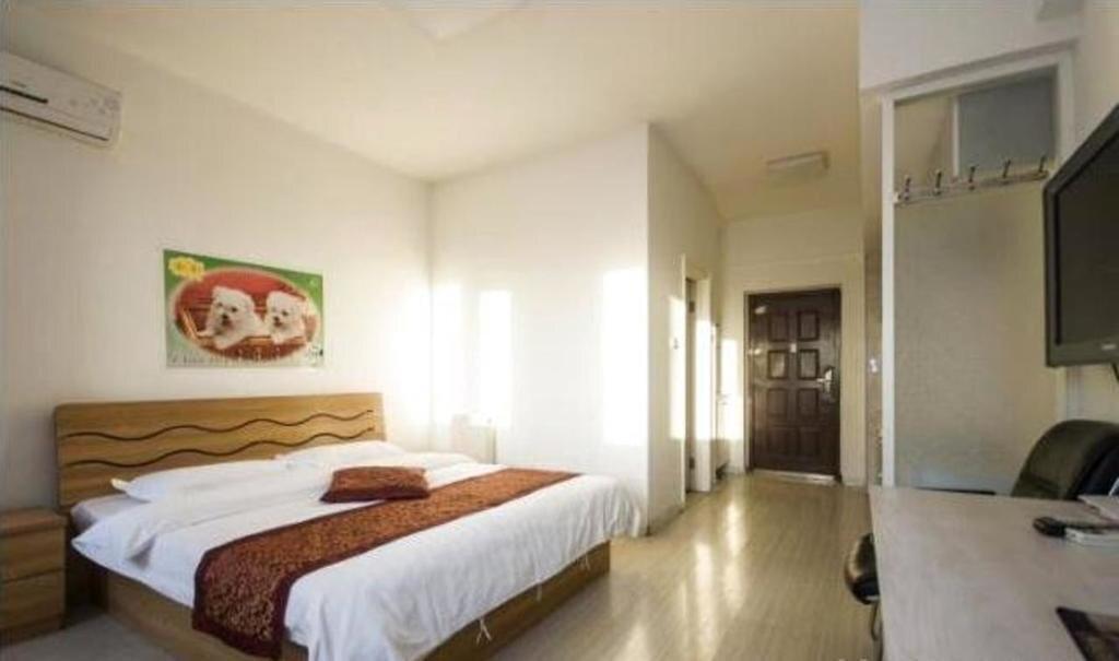 Паниин: Panjin Xinyuan ApartHotel