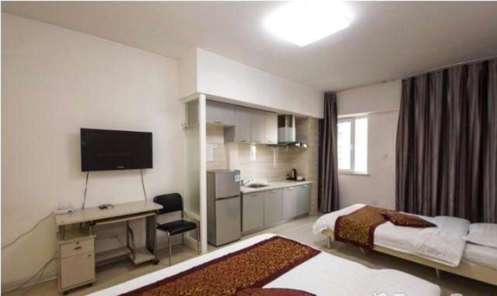Паниин: Panjin Xinyuan ApartHotel