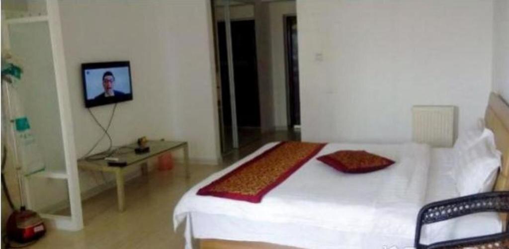 Паниин: Panjin Xinyuan ApartHotel