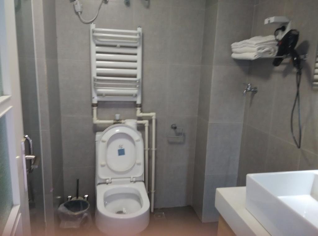 Паниин: Panjin Xinyuan ApartHotel