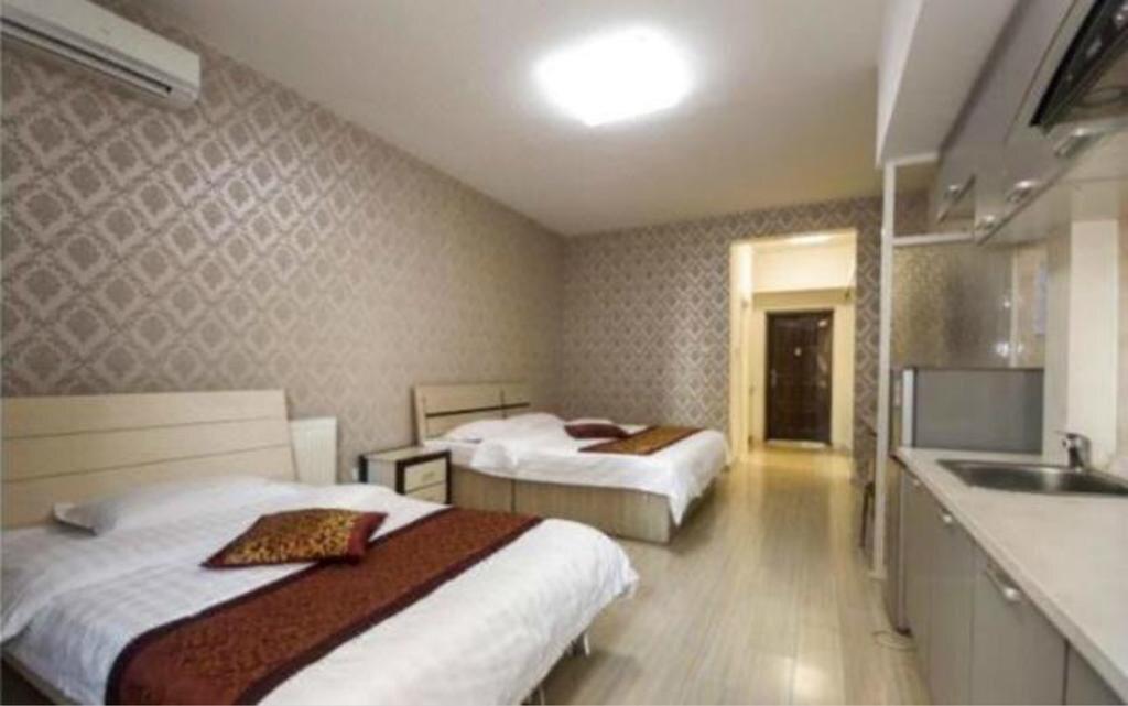 Паниин: Panjin Xinyuan ApartHotel