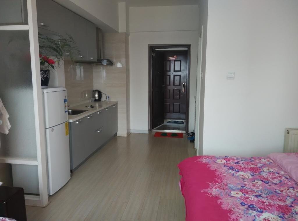 Паниин: Panjin Xinyuan ApartHotel