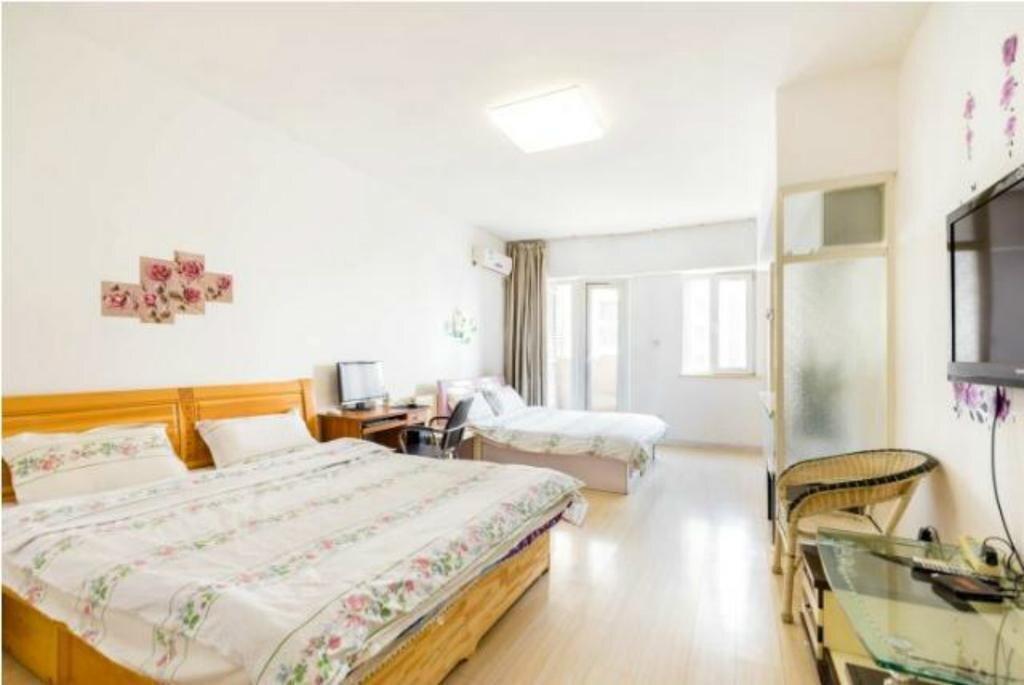 Паниин: Panjin Xinyuan ApartHotel