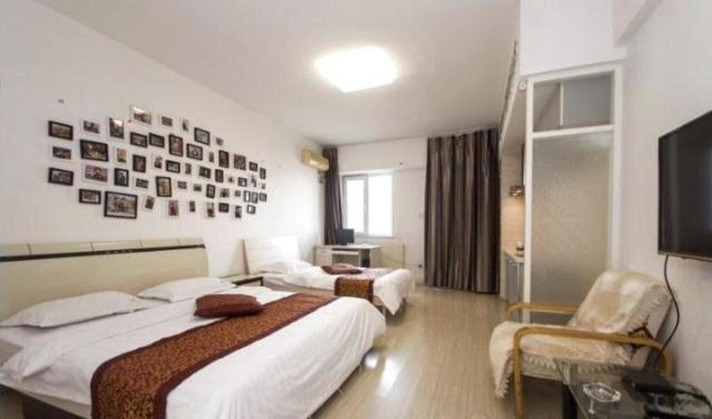 Паниин: Panjin Xinyuan ApartHotel