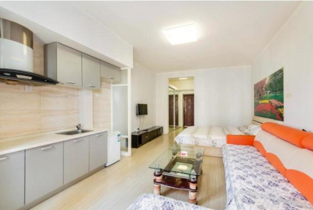 Паниин: Panjin Xinyuan ApartHotel