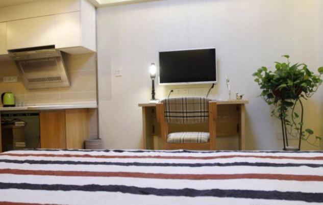 Чжучжоу: Zhuzhou Chengshi Qingnian Apartment