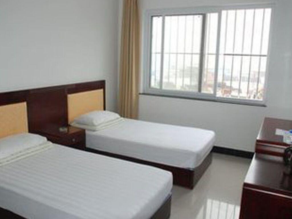 Цзинин: Yanzhou Garden Inn