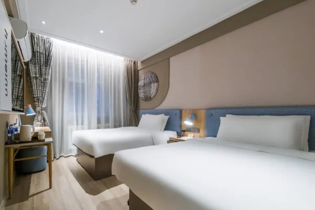 Шэньян: Home Inn Shenyang Xinmin Railway Station Branch