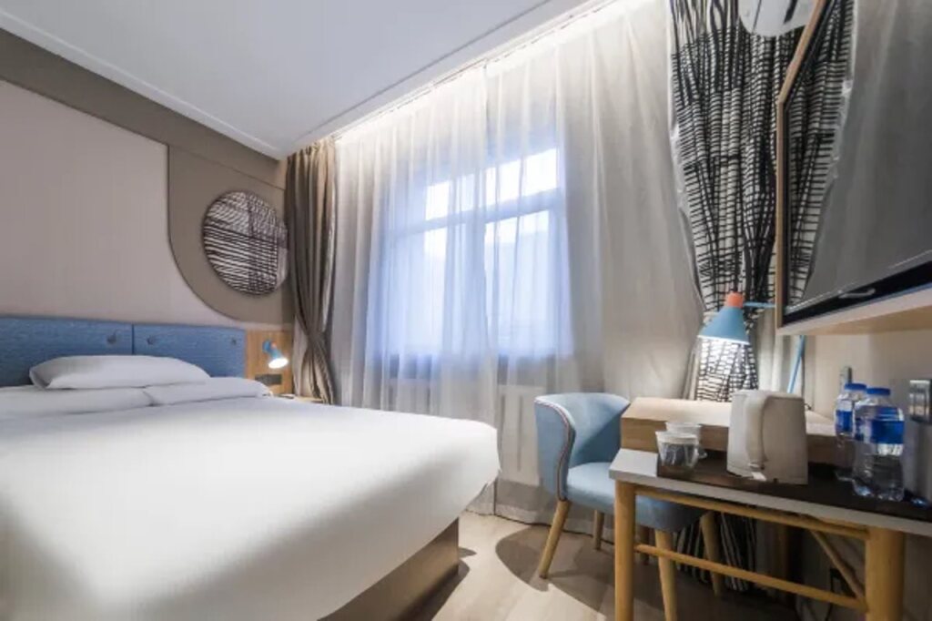 Шэньян: Home Inn Shenyang Xinmin Railway Station Branch