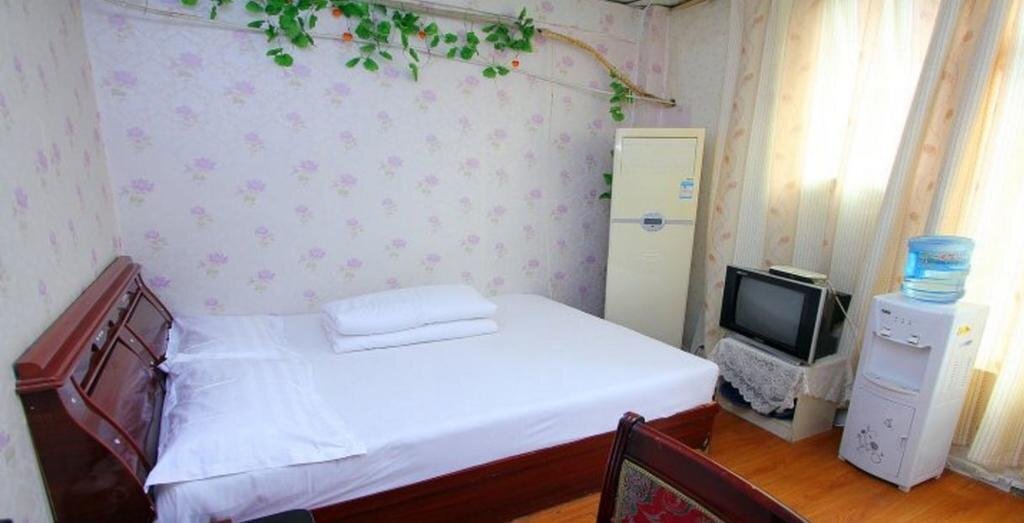 Цзинин: Huayu Express Inn