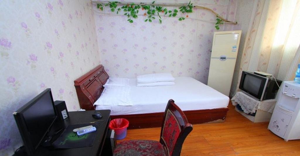 Цзинин: Huayu Express Inn
