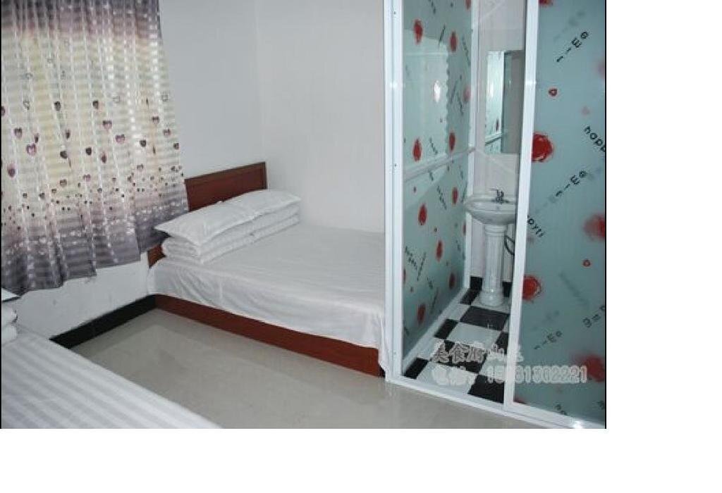 Байшань: Changbaishan Xiangcun Inn