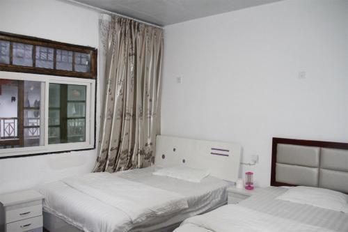 Яань: Ya'an Shimian Old Street Inn