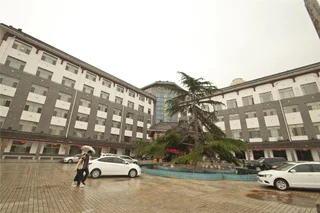 Цзинин: Grace Inn (Qufu Tourist Center)