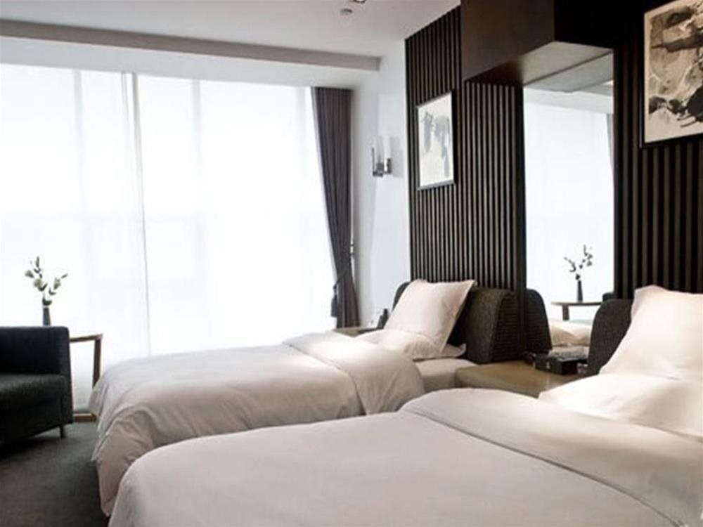 Цзыбо: Golden Charm Boutique Hotel