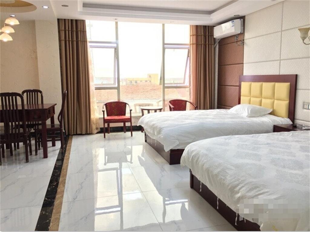 Наньтун: Nantong Suzhong Business Hotel