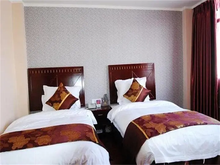Сичан: Xichang Xiaoding Business Hotel