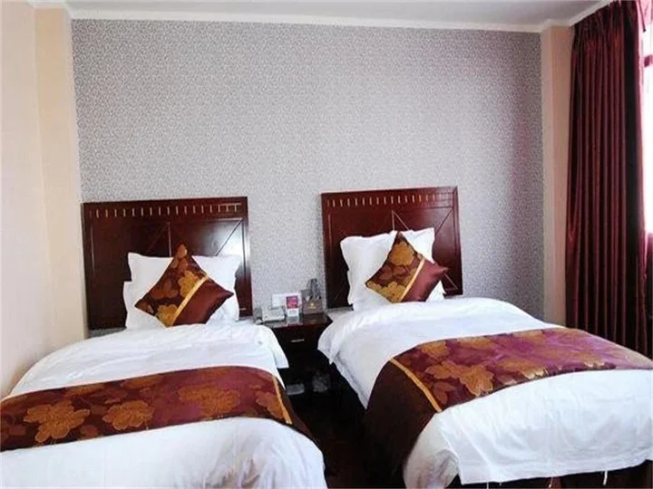 Сичан: Xichang Xiaoding Business Hotel
