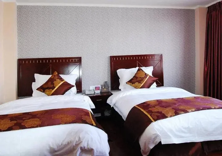 Сичан: Xichang Xiaoding Business Hotel