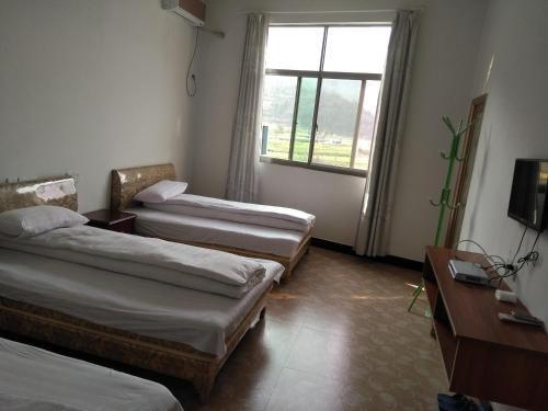 Шанграо: Wuyuan Jiangling Huatian Hostel