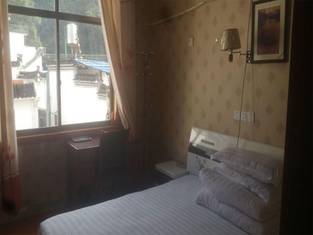 Шанграо: Wuyuan Meihua Hotel