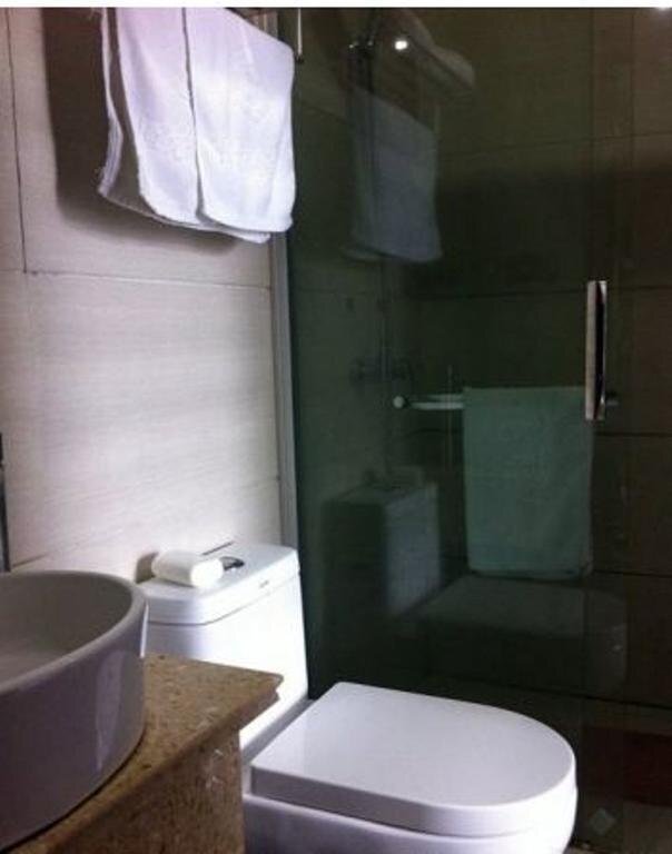 Наньтун: Henglong Business Inn