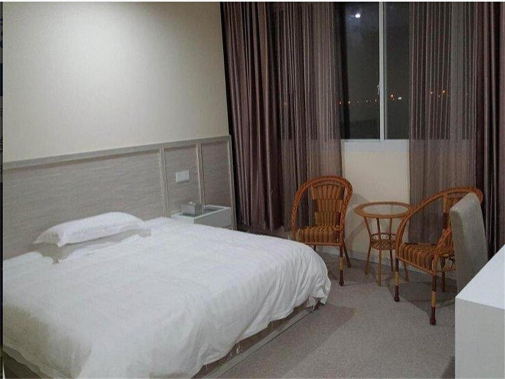 Наньтун: Henglong Business Inn