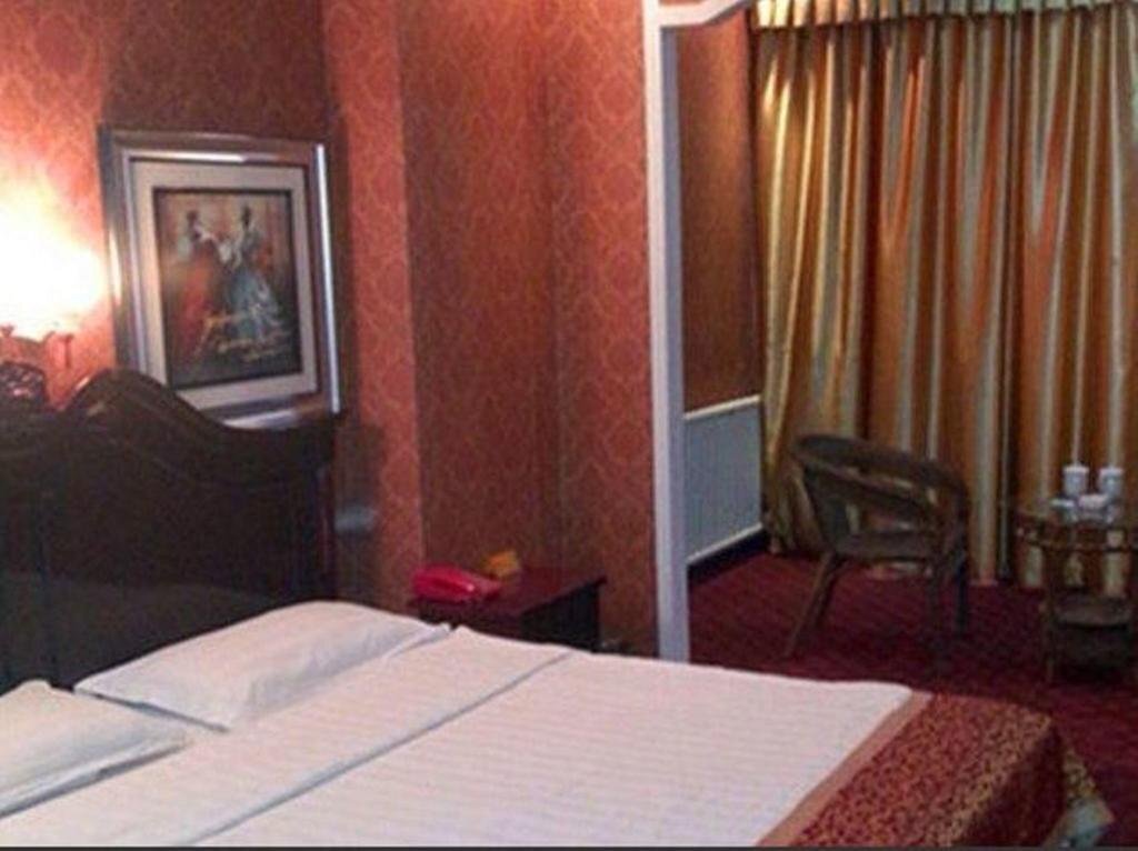 Линьи: Yidali Business Hotel