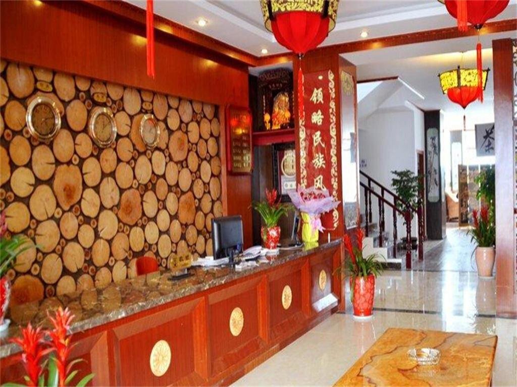 A Mi Zi Min Su Hotel — фото 3