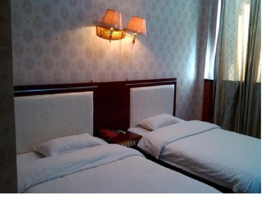 Яньань: Luo Chuan Guo Hao Business Inn