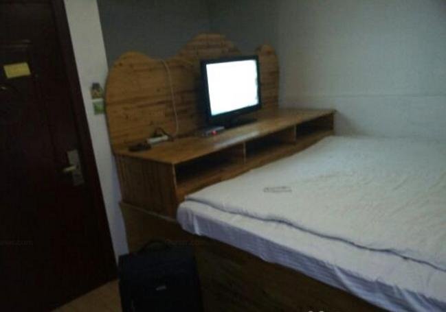 Цзинин: Qufu Ruiyuan Business Inn