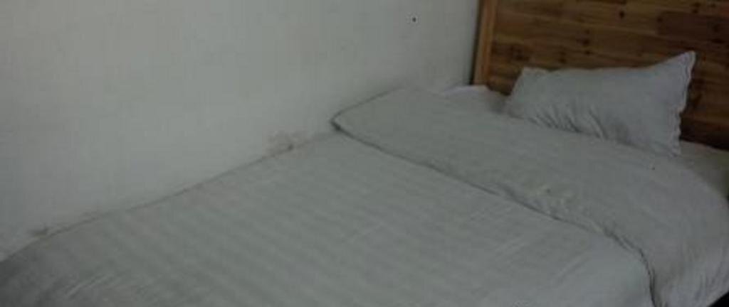 Цзинин: Qufu Ruiyuan Business Inn