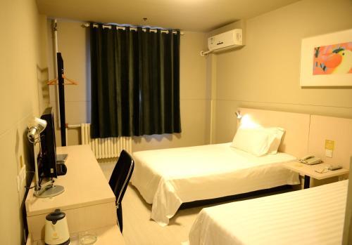 Цзинин: Jinguang Express Hotel Qufu Tourist Centre Sankong