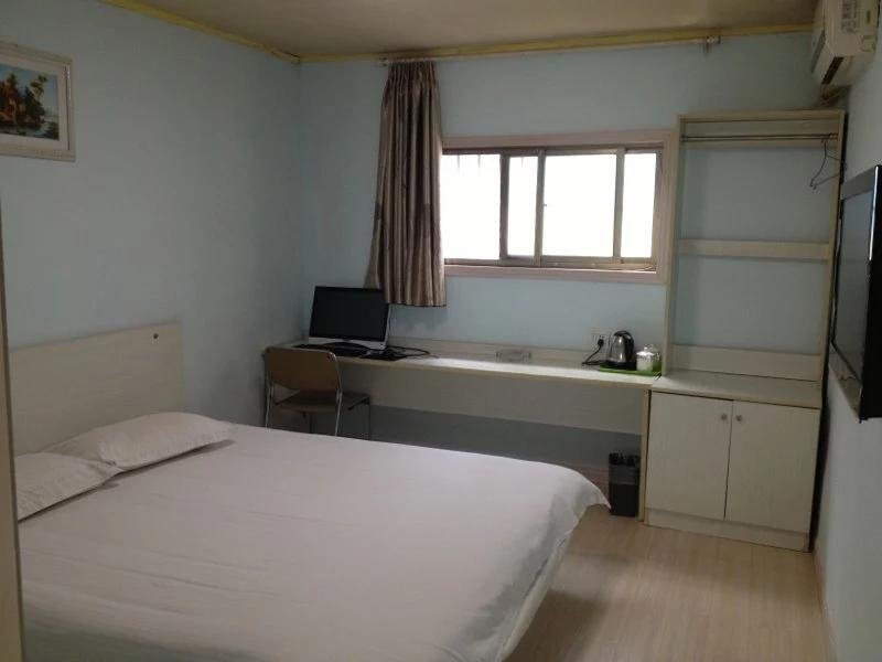Цзинин: Qufu Hao Ke Business Inn