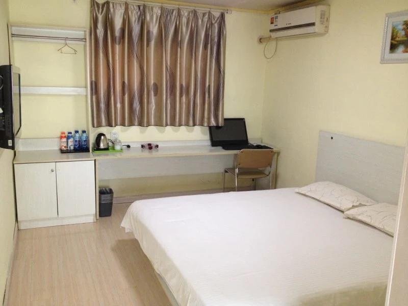 Цзинин: Qufu Hao Ke Business Inn