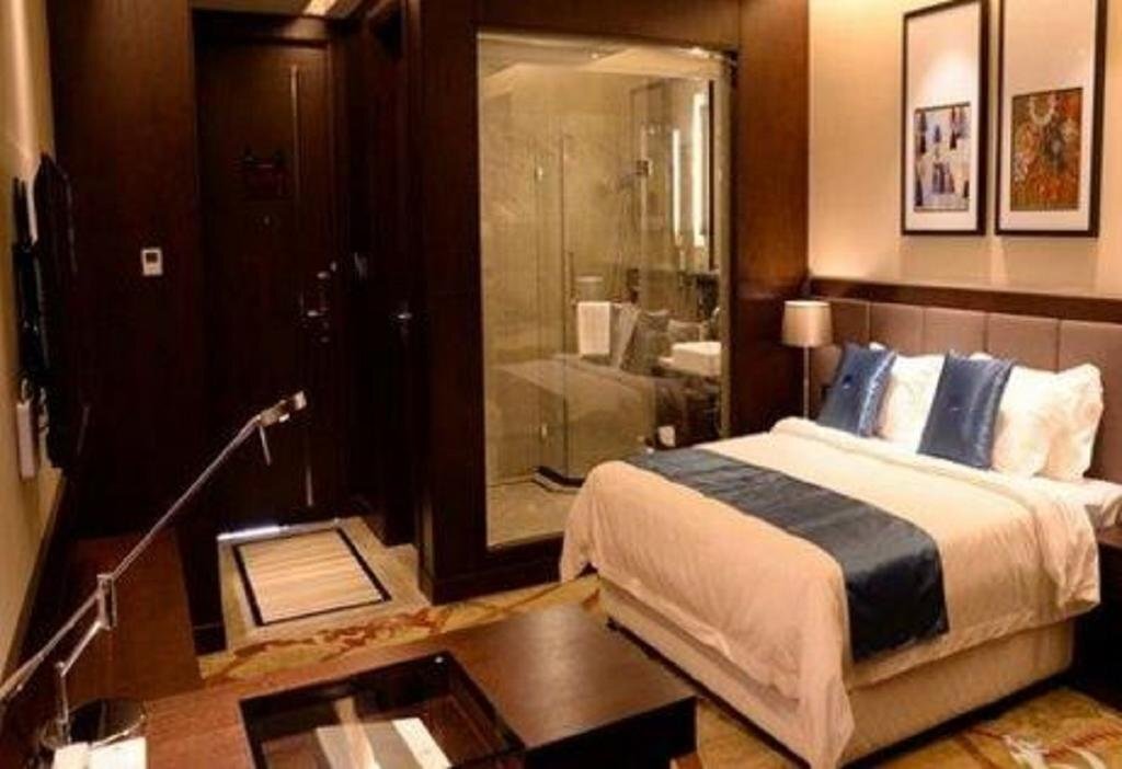 Фошань: Qianxi Business Hotel