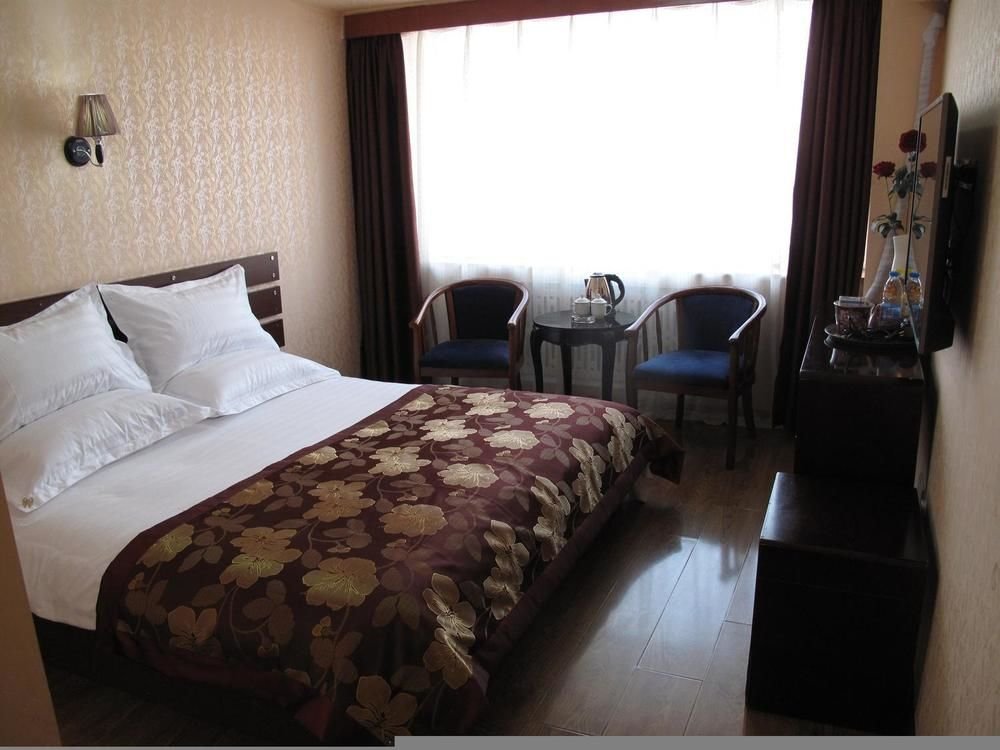 Харбин: Beibei Holiday Hotel Harbin Central Street Xinyang Road