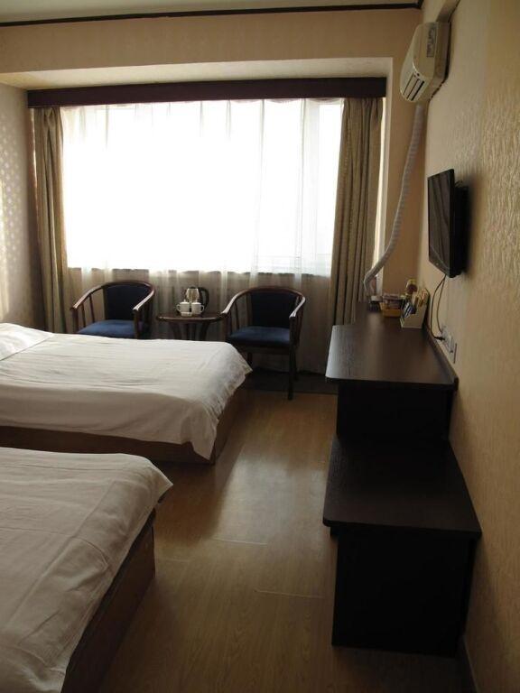 Харбин: Beibei Holiday Hotel Harbin Central Street Xinyang Road