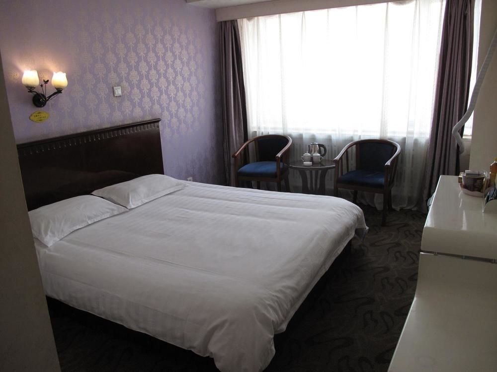 Харбин: Beibei Holiday Hotel Harbin Central Street Xinyang Road