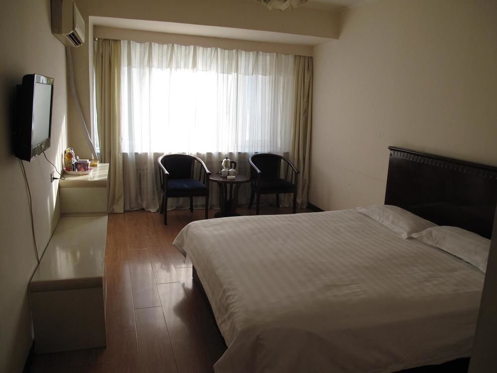 Харбин: Beibei Holiday Hotel Harbin Central Street Xinyang Road
