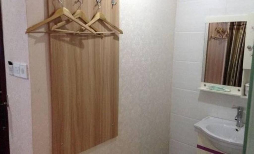 Цюйцзин: Qujing Ruixin Business Hotel