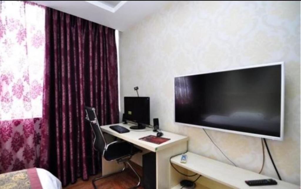 Цюйцзин: Qujing Agricultural Materials Hotel