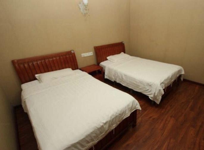 Эньши: Mingdu Business Inn