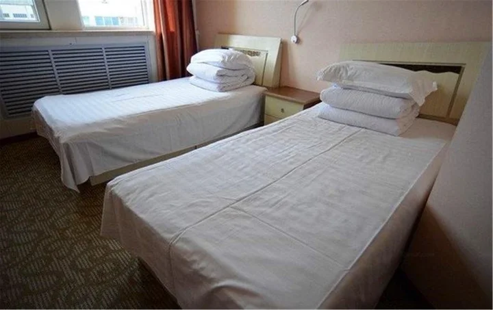 Далянь: Dalian Xingyue Inn
