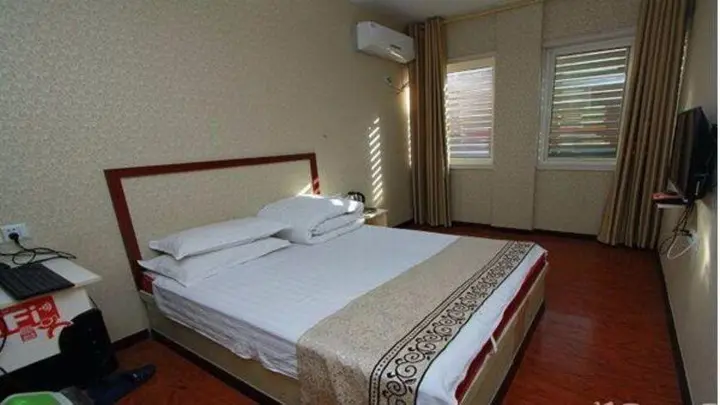 Цзинин: Qufu Shengrun Inn